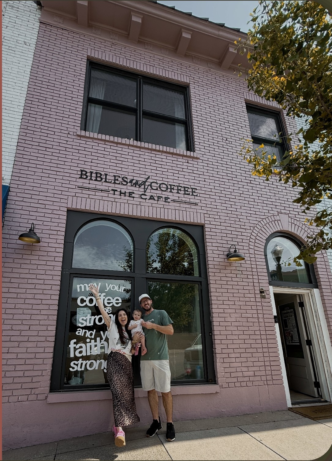 The family behind Bibles and Coffee outside the cafe